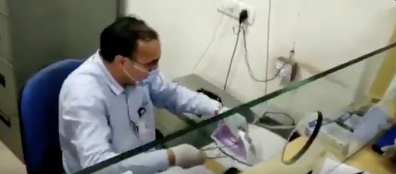 pegawai bank guna seterika je untuk bunuh covid-19