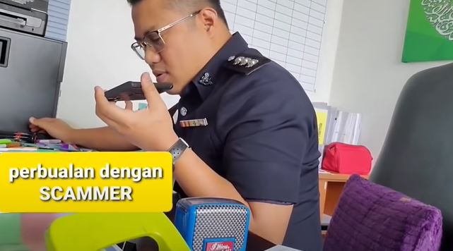 tercyiduk! polis layan scammer menyamar, siap ajar buat report polis tu