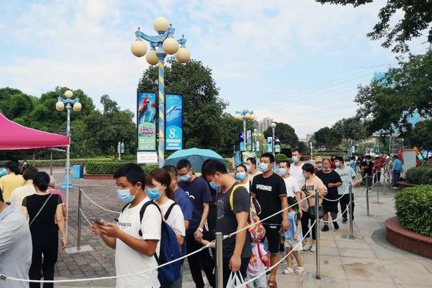 ribuan pelancong bersesak di wuhan; lokasi pertama tular covid-19