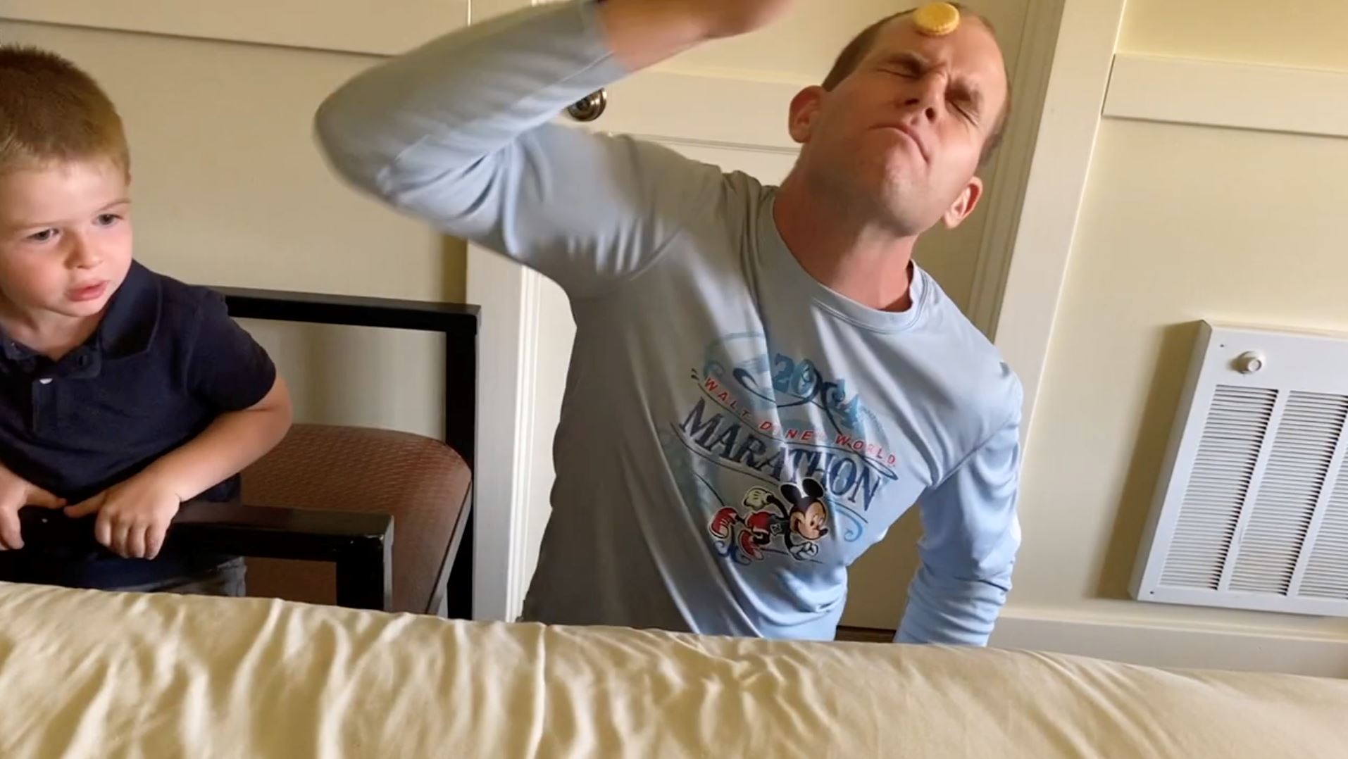 man sets new guinness record for moving cookie from forehead to mouth