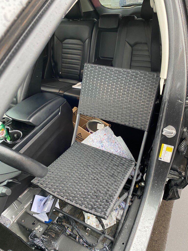 driver summonsed for using a lawn chair as a car seat
