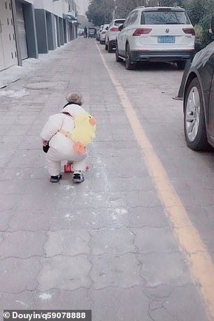 1yo picks up rubbish thrown from car and hands it back to man who threw it