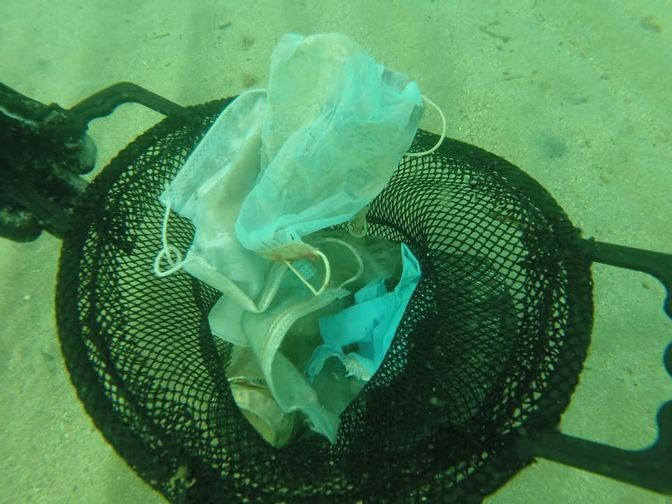 disposable face masks and ppe have been found littering the ocean floors 
