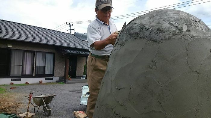 these grandparents built a life-sized totoro bus stop for their grandchildren!