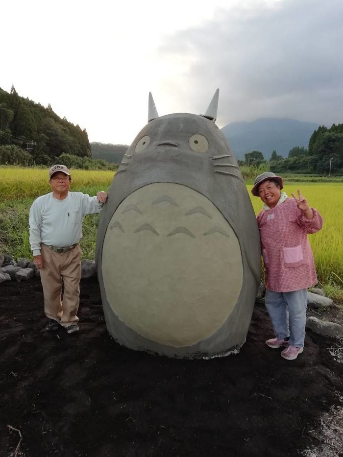 these grandparents built a life-sized totoro bus stop for their grandchildren!