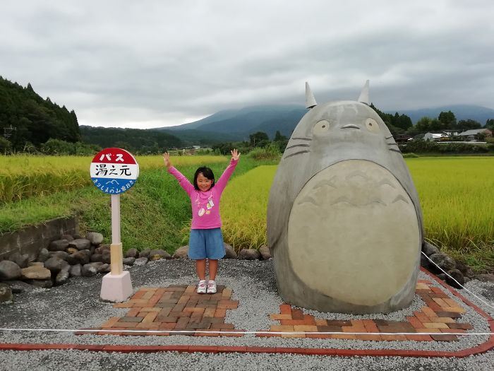 these grandparents built a life-sized totoro bus stop for their grandchildren!