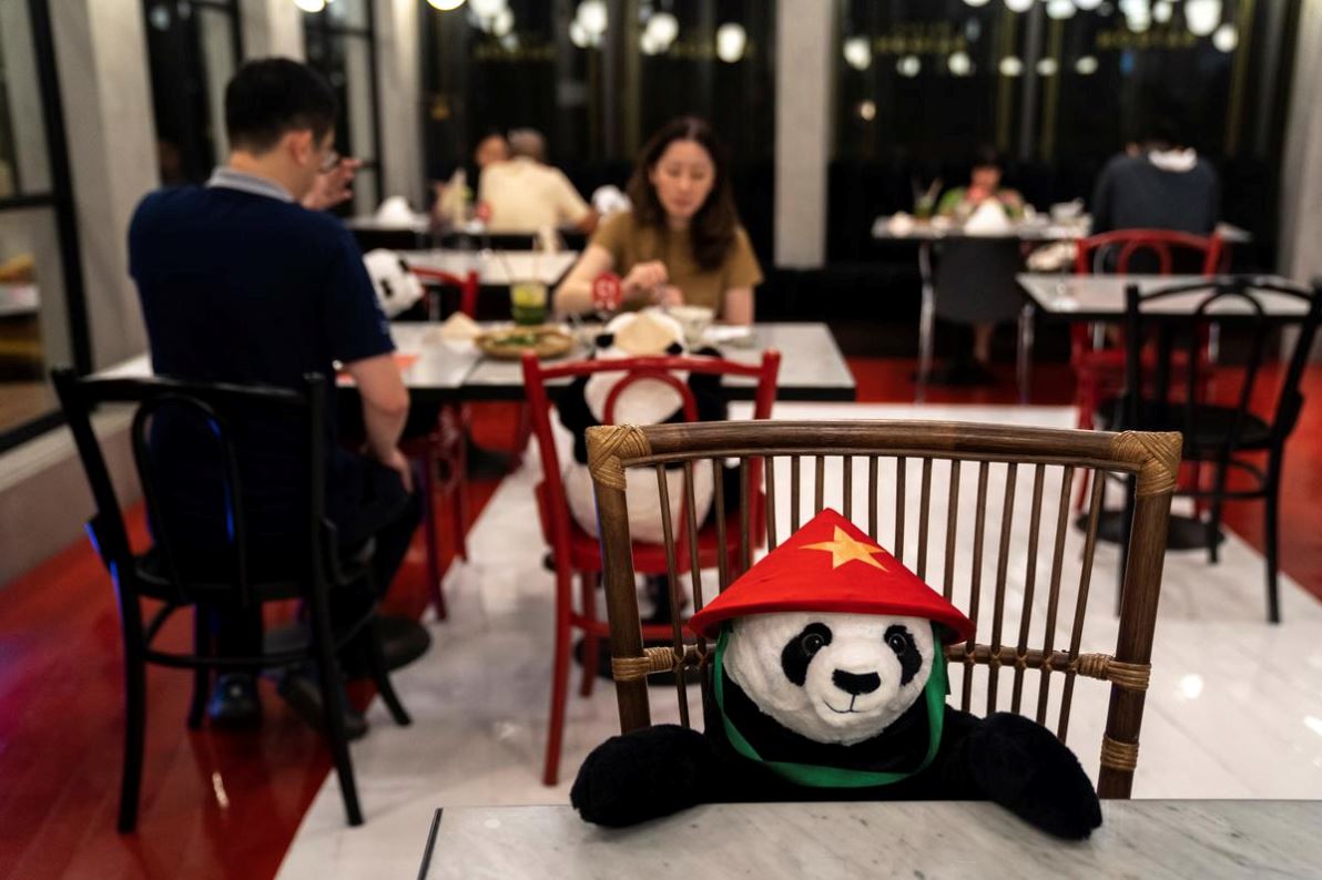 thai restaurant uses toy pandas to ensure diners practice social distancing