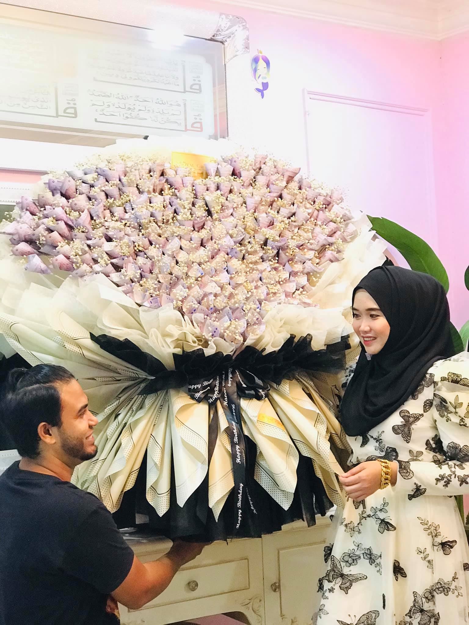 man celebrates wife’s 29th birthday with rm29,000 cash flower bouquet