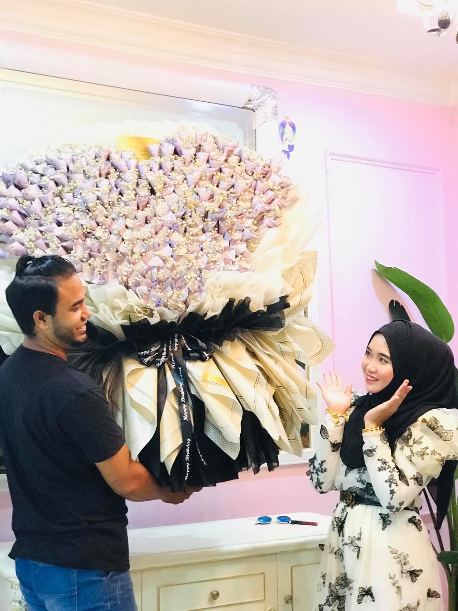 man celebrates wife’s 29th birthday with rm29,000 cash flower bouquet