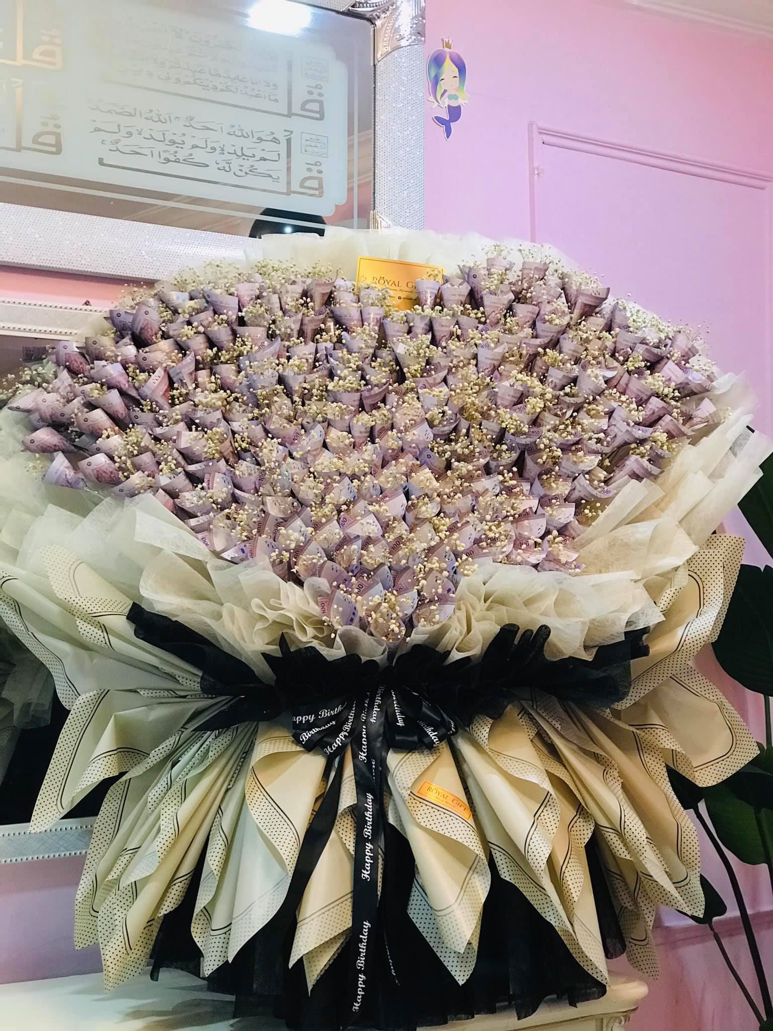 man celebrates wife’s 29th birthday with rm29,000 cash flower bouquet