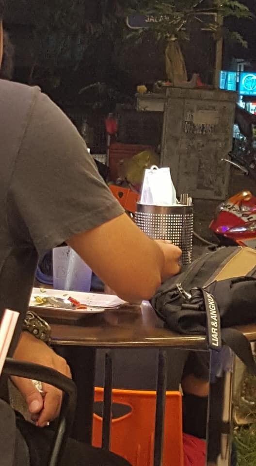 msians are angry after seeing man place face mask in cutlery holder