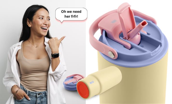 A girl pointing towards a drinkware