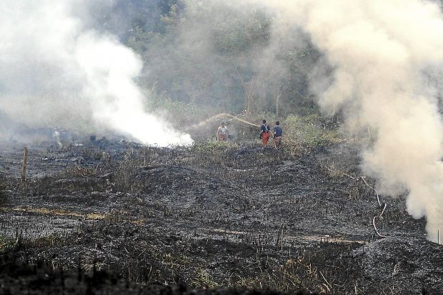 doe bans open burning, amid ongoing haze