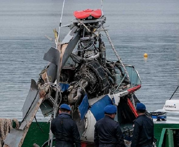 crashed chopper salvaged from river