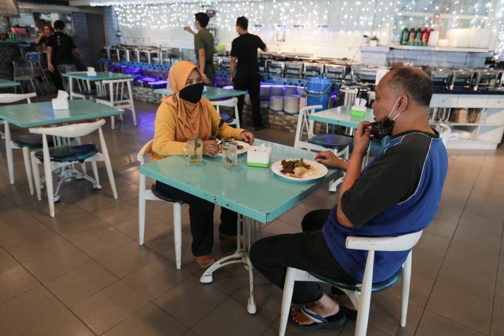 up to four people can sit, dine together ‘if table is big’