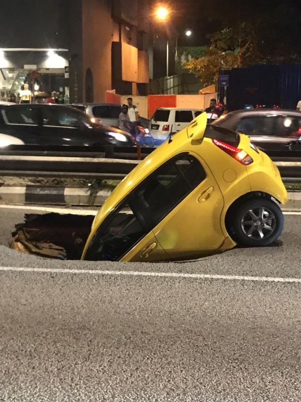 car swallowed by a sinkhole in kuala lumpur