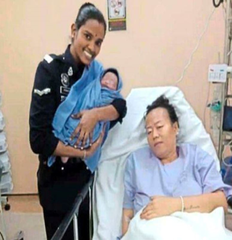 policewoman turned midwife delivers a baby in a taxi!