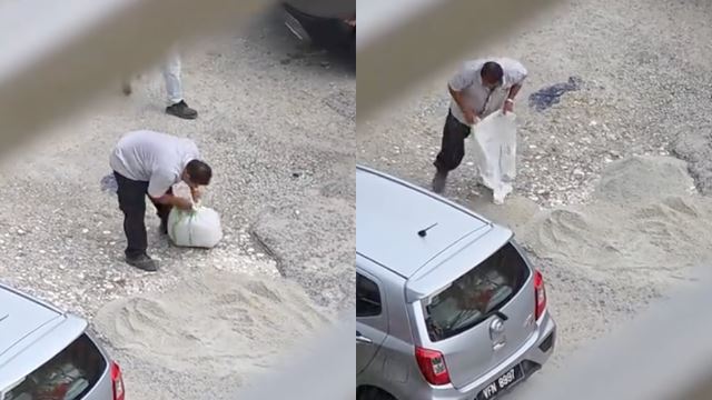 Malaysians Praise Kind Uncle for Covering Pothole in the Rain to Help Drivers